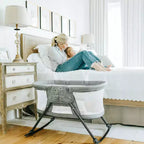 Culla portatile a dondolo Baby Delight Slumber Deluxe: capottina, base a dondolo, struttura in metallo
