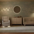 Babyletto Kiwi Deluxe Poltrona reclinabile elettrica e girevole con funzione dondolo, riscaldamento e massaggio