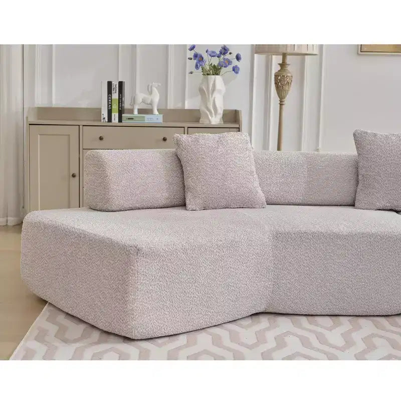 GDFStudio Arvik 140 Moderno Divano Sezionale a L a 4 Posti Rivestito in Bouclé con 4 Cuscini