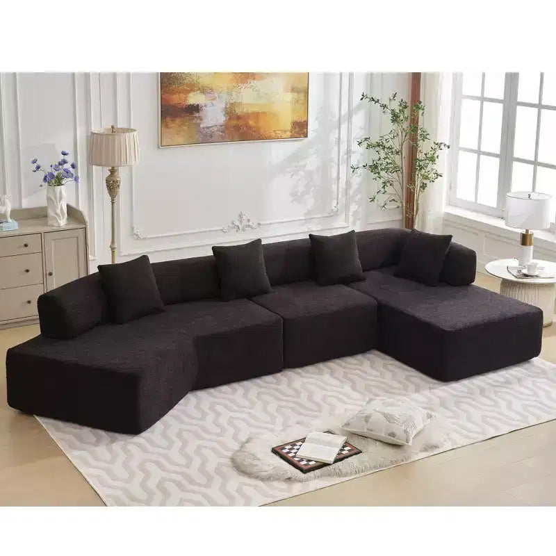 GDFStudio Arvik 140 Moderno Divano Sezionale a L a 4 Posti Rivestito in Bouclé con 4 Cuscini