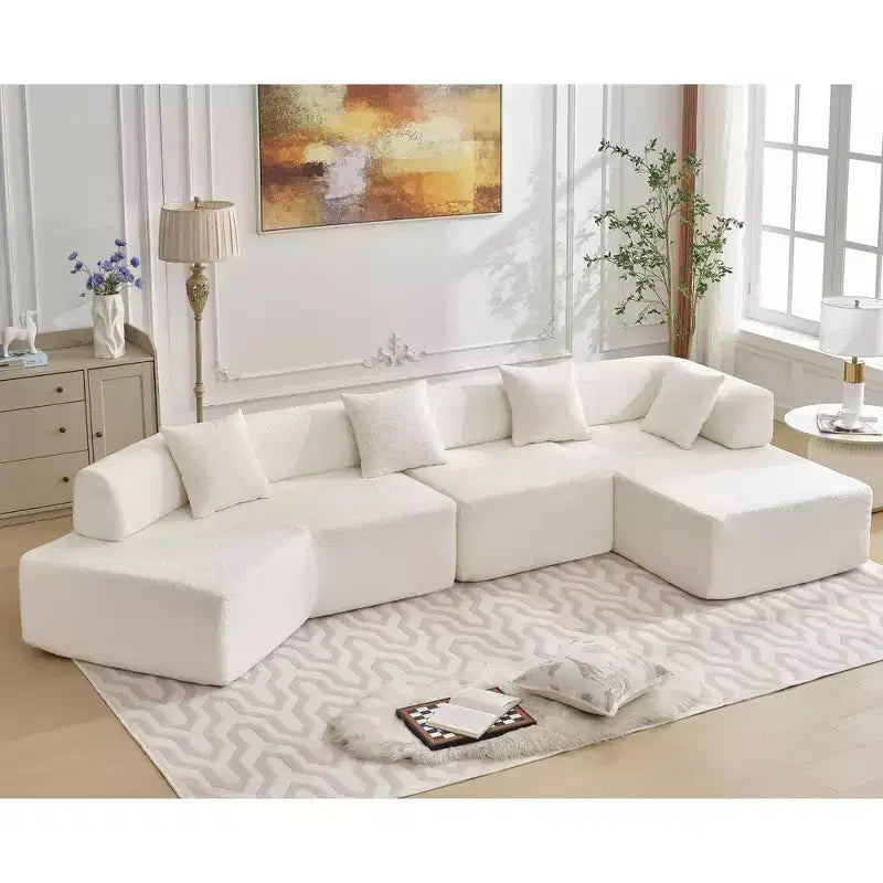 GDFStudio Arvik 140 Moderno Divano Sezionale a L a 4 Posti Rivestito in Bouclé con 4 Cuscini