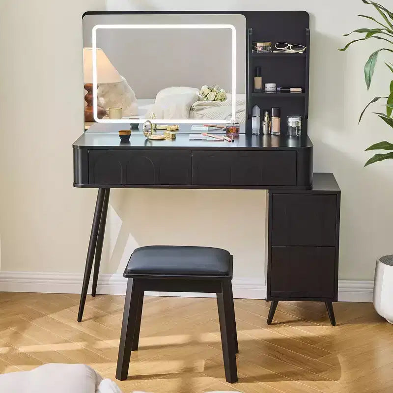 Moderna toeletta angolare con specchio illuminato, 4 cassetti, mobile laterale, sgabello abbinato e ripiani aperti per la camera da letto