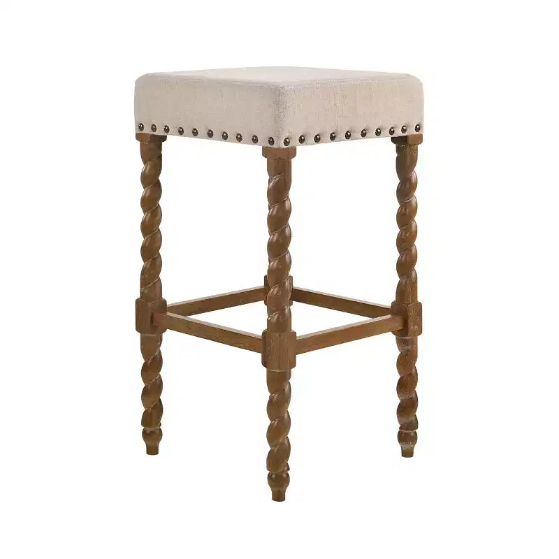 Sgabello da bar Cadmus 30" in rovere naturale Carolina Living: sedile imbottito, bordo in ottone anticato
