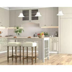 Sgabello da bar Cadmus 30" in rovere naturale Carolina Living: sedile imbottito, bordo in ottone anticato