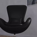 Poltrona lounge Merrick Lane stile "Egg" con schienale alto e base girevole in metallo a 360°