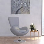 Poltrona lounge Merrick Lane stile "Egg" con schienale alto e base girevole in metallo a 360°