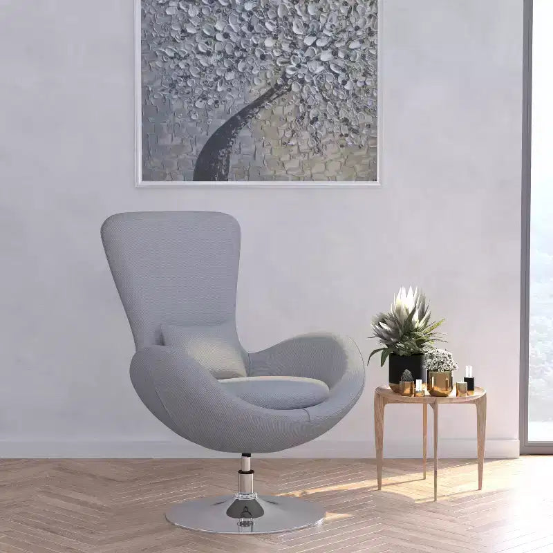 Poltrona lounge Merrick Lane stile "Egg" con schienale alto e base girevole in metallo a 360°