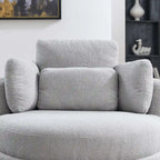 Poltrona moderna girevole a botte a due posti con 4 cuscini e pouf contenitore